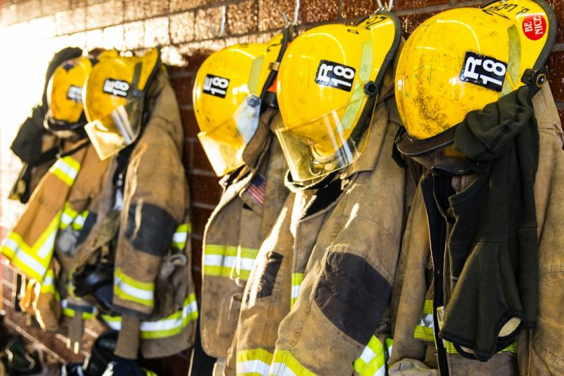 Essential Questions About Rapid Fire Watch Support for Texas Businesses Firefighter helmets and uniforms hanging on a wall